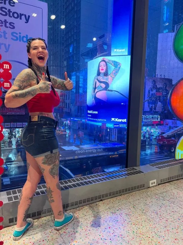 Tattoo model's naked dress sparks frenzy as she ends up on Times Square