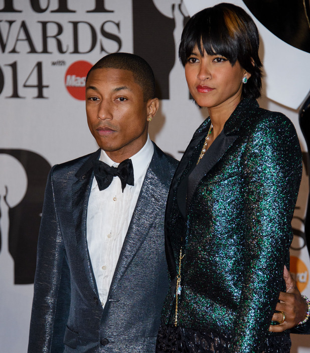 Pharrell Williams cuddles up to wife Helen at Brit Awards after party