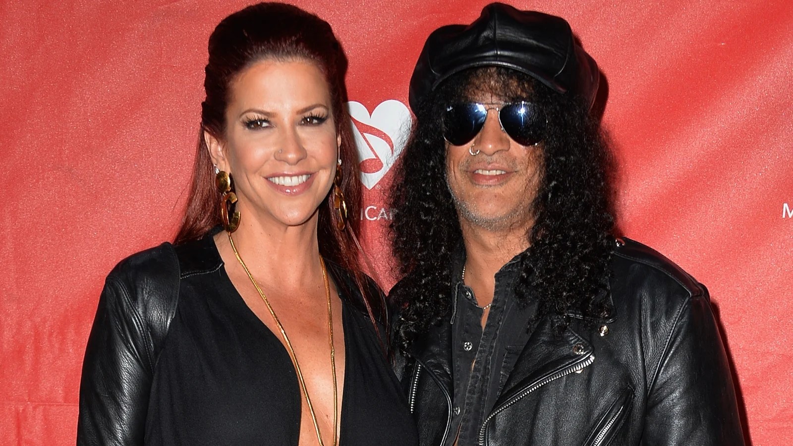 Slash files for divorce from wife