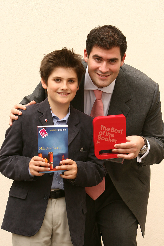 Zafar and Milan Rushdie with the winning trophy and book ©… Flickr