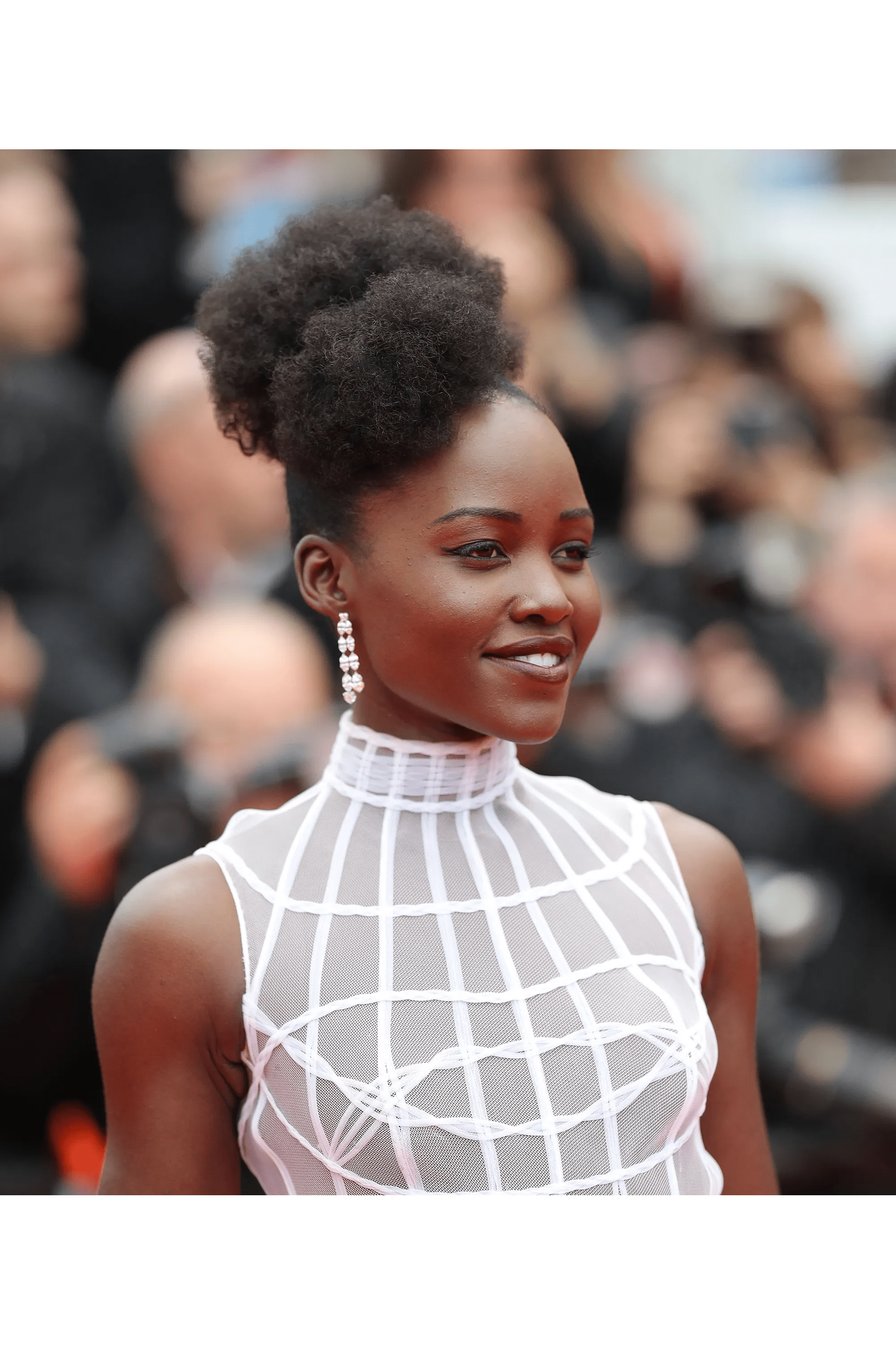 Lupita Nyong'o Says Women Are Still 'Shunned' for Their Natural Hair