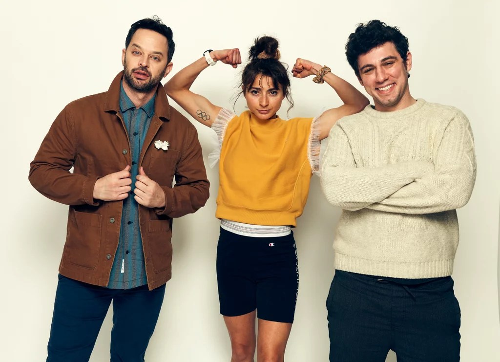 Pappas with her Olympic Dreams costar Nick Kroll (left) and husband