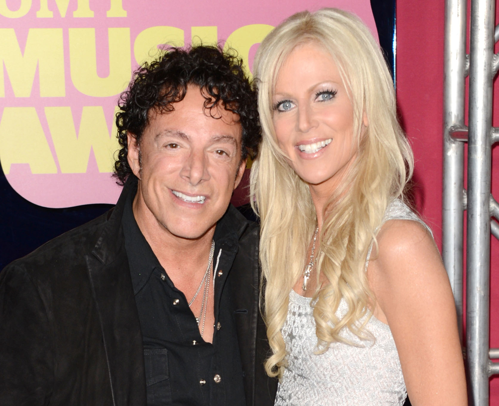 Neal Schon of Journey and Michaele Salahi get engaged onstage