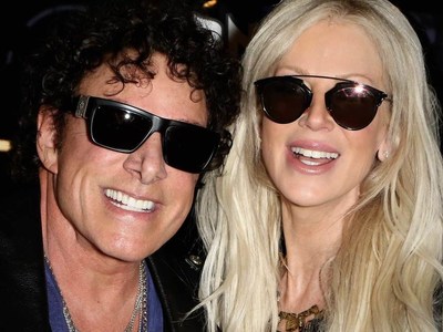 Journey's Neal Schon is helping his wife, former "RHODC" star Michaele