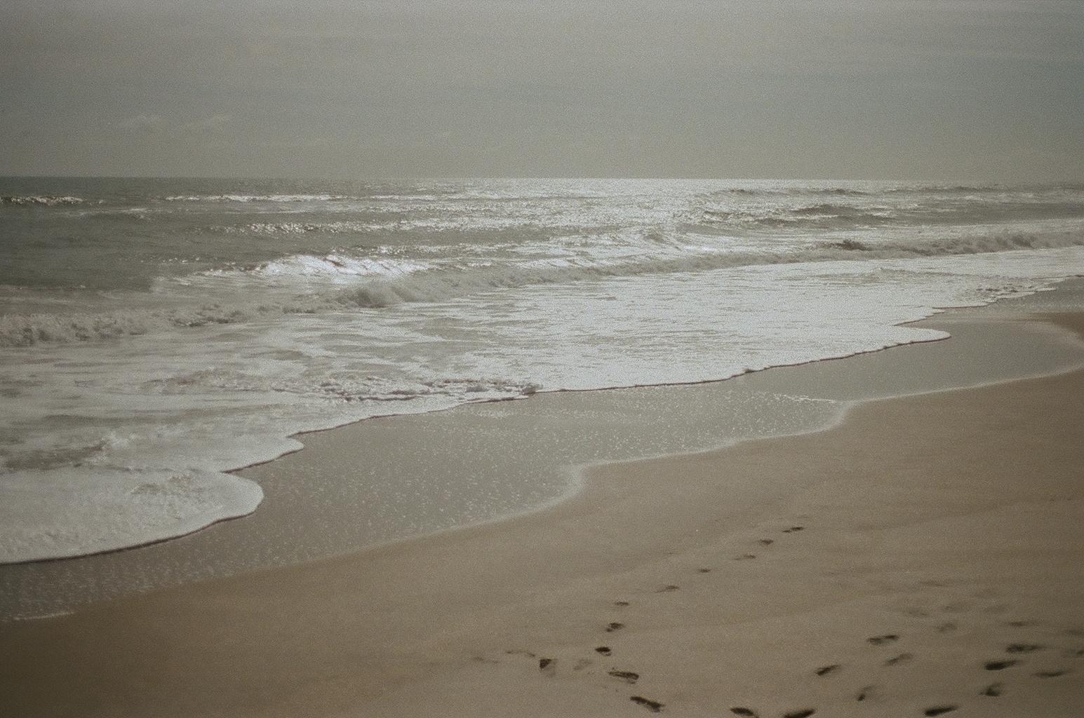 beach waves with rays of sunlight