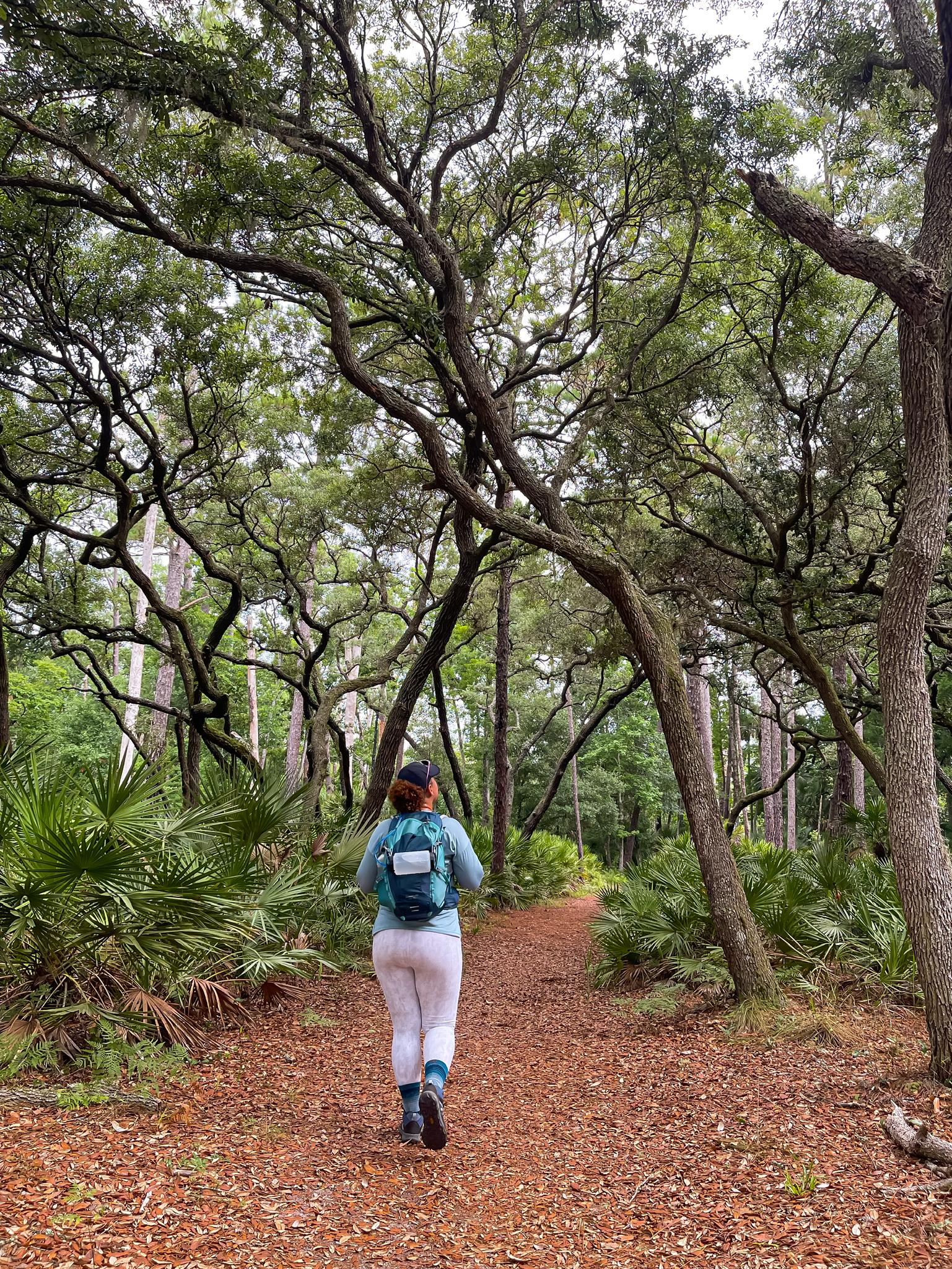 woman solo hiking on wekiva springs trails