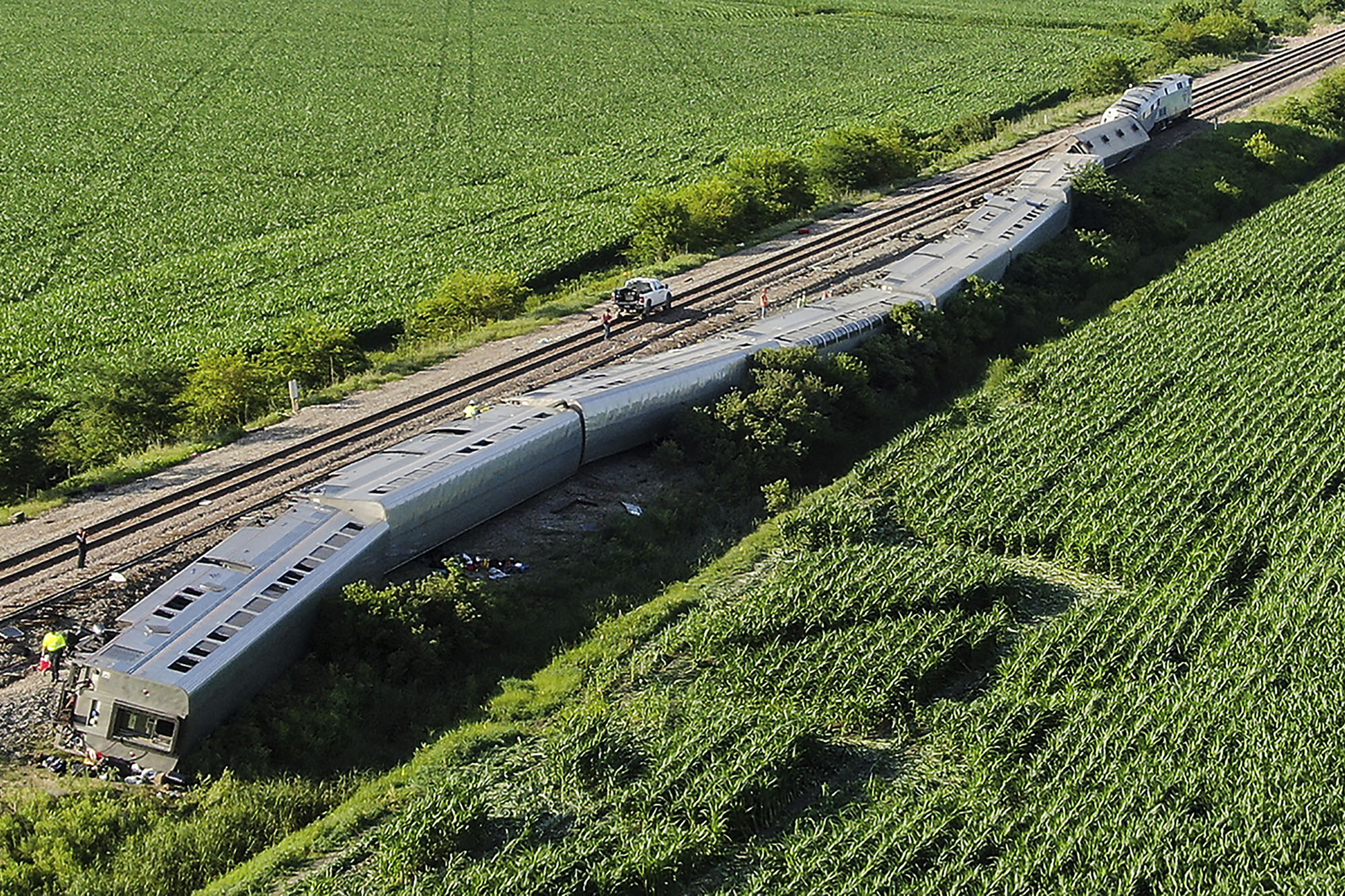 Boy Scout comforted dying truck driver after Amtrak derailment, father