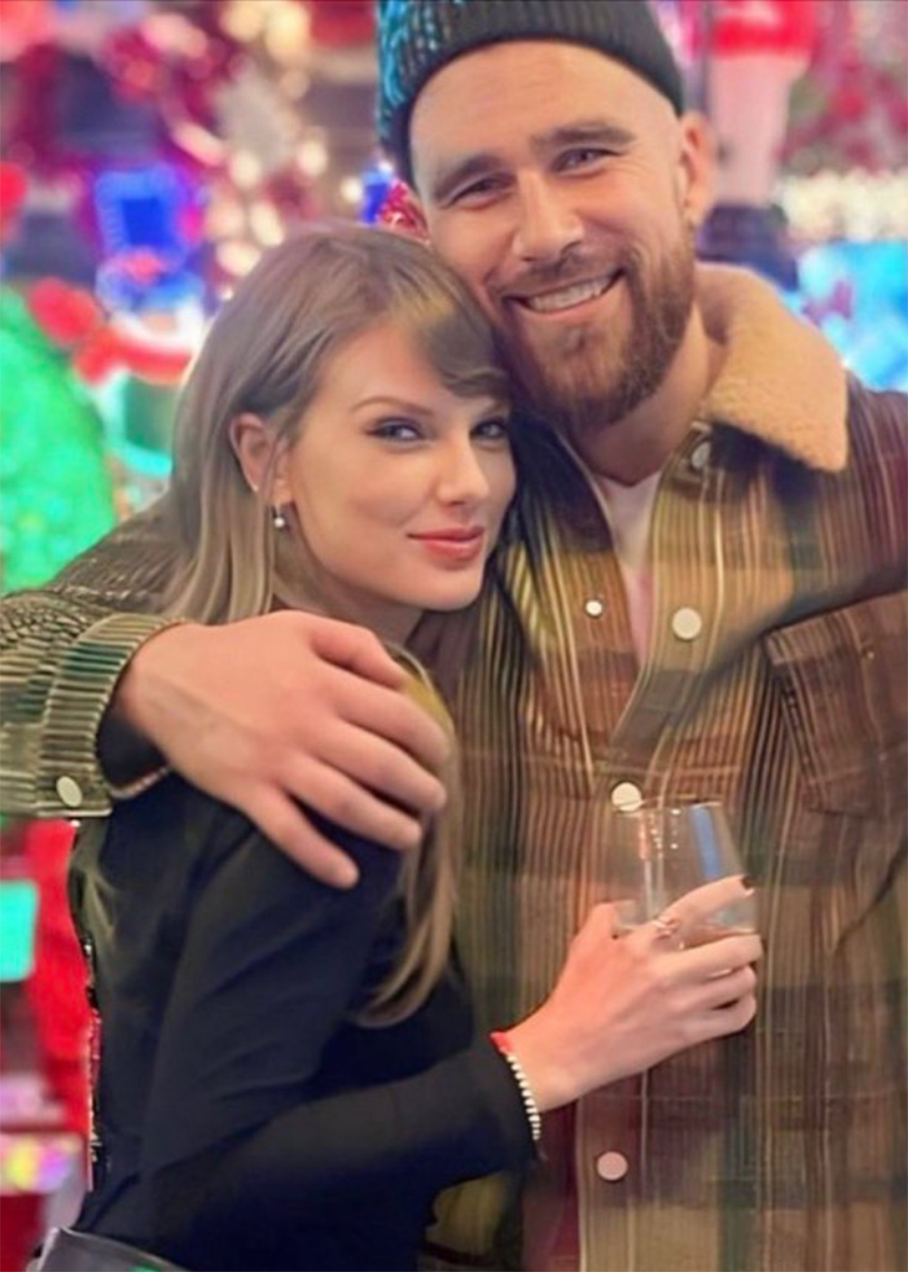Travis Kelce, Taylor Swift celebrate New Year's Eve with a kiss