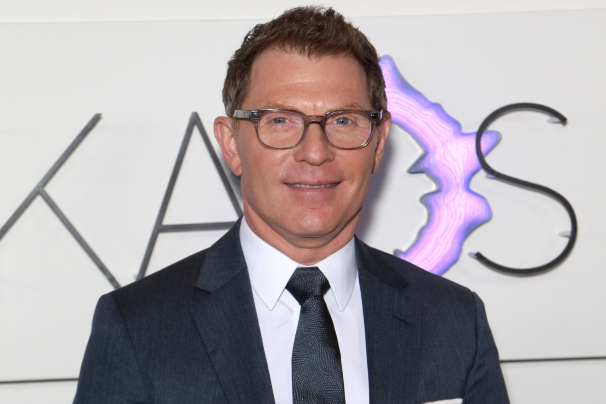 Bobby Flay sings 'Happy Birthday' for guest at Melba Wilson's Harlem eatery