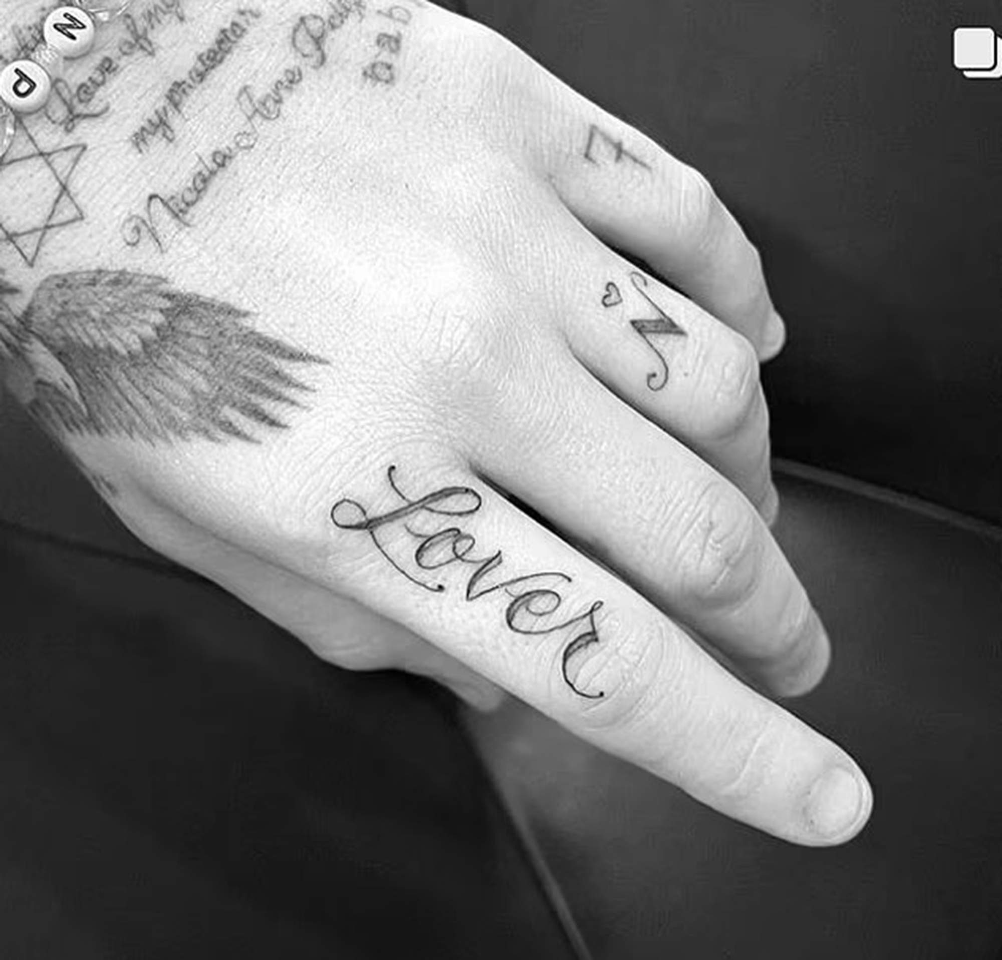 Brooklyn Beckham tattoos wedding vows to Nicola Peltz on his arm