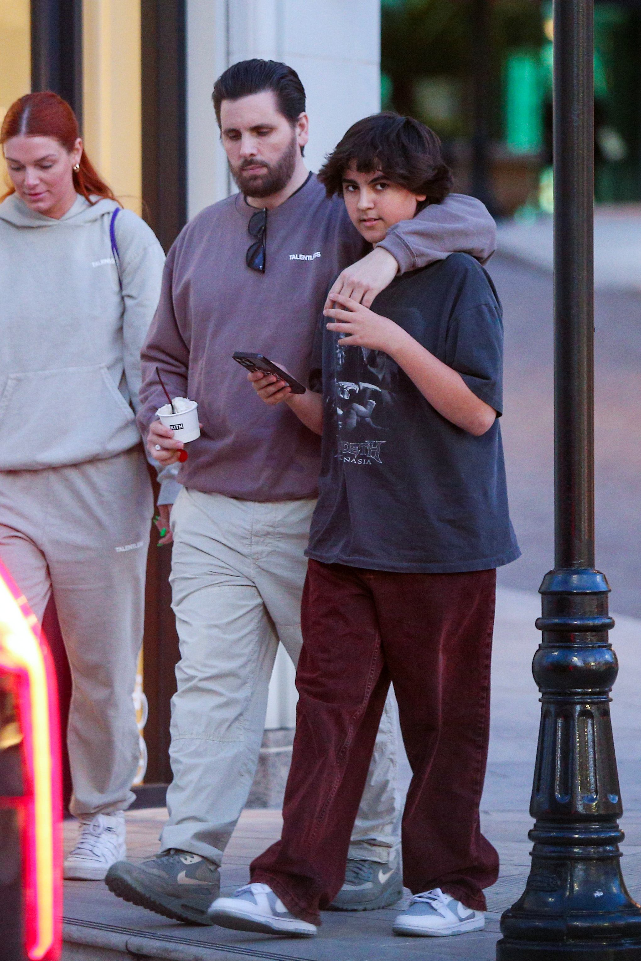 Mason Disick, 13, looks nearly as tall as dad Scott on afternoon outing