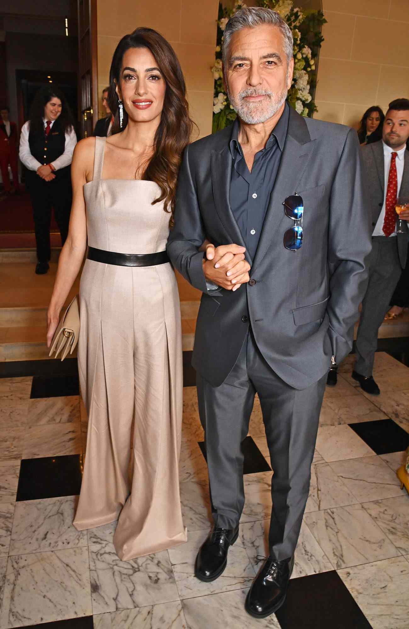 and Amal Clooney Photographed Holding Hands at The Prince's