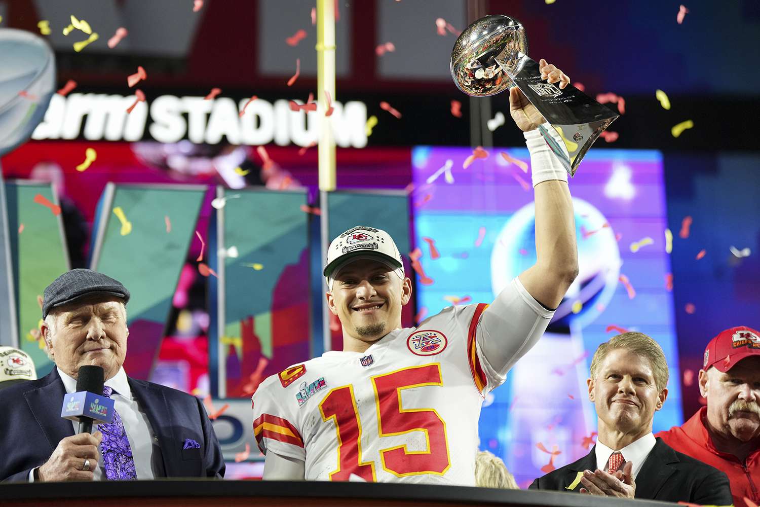 Patrick Mahomes Celebrates Super Bowl Victory with Trophy, WWE Belt