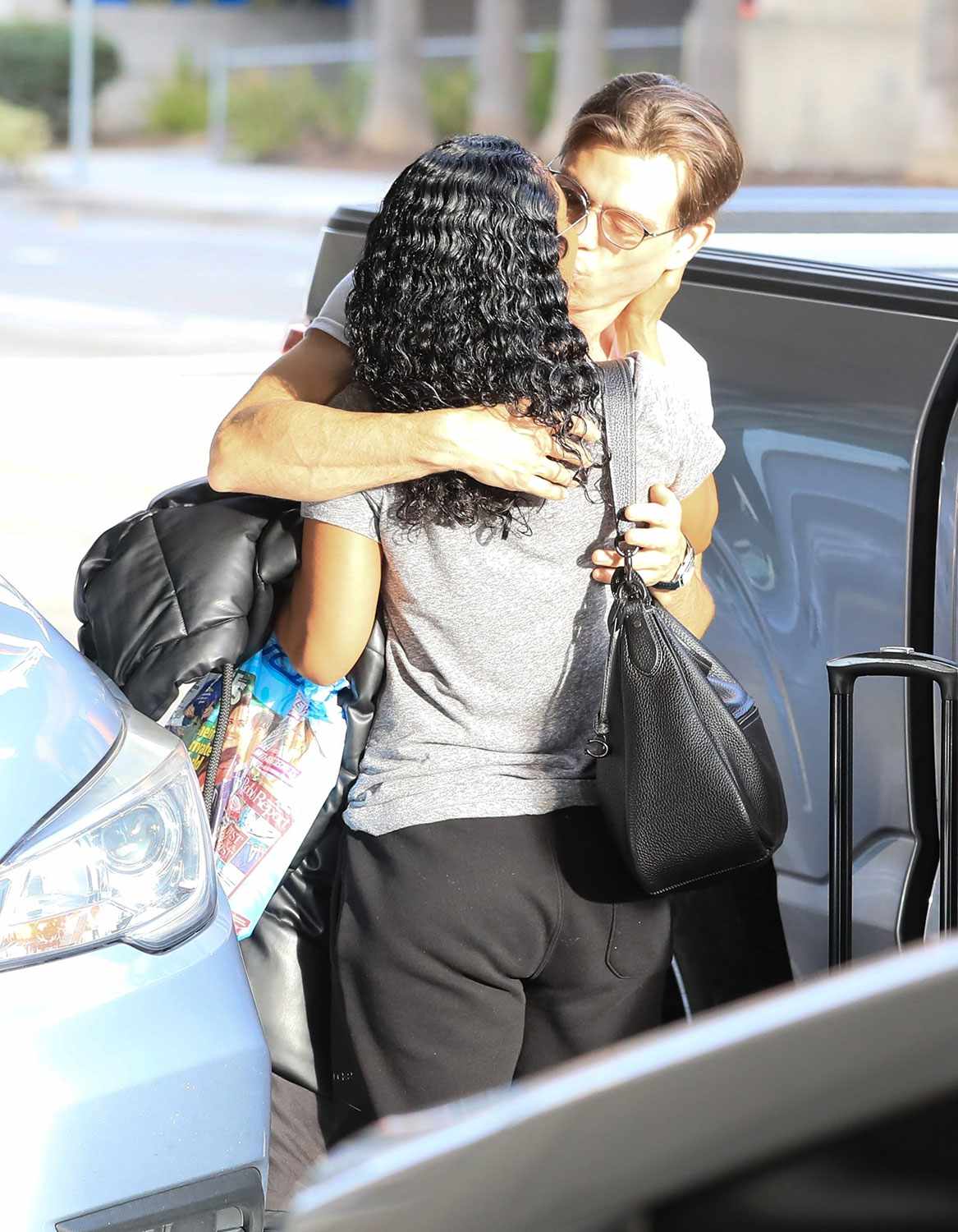 TLC's Chilli and Matthew Lawrence Pucker Up During Airport Pickup