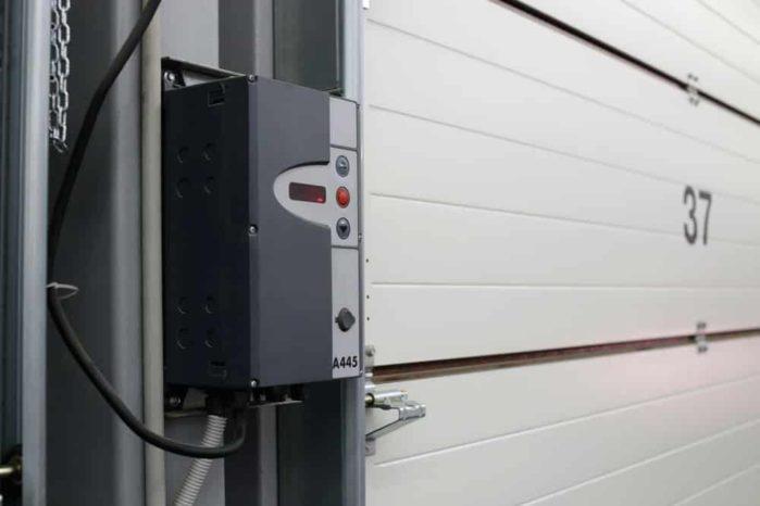 Closeup switch control up and down Garage Door Repair