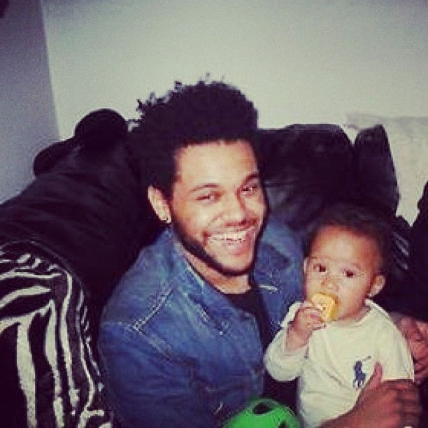 abel The Weeknd and I think his son the caption to it was "baby boy