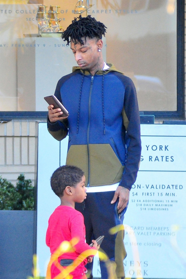 Rapper 21 Savage was spotted doing some shopping with his young son and