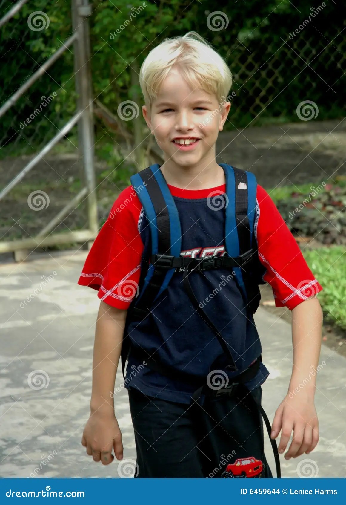 Boy Arrives Home From School Stock Photo Image of summer, knapsack