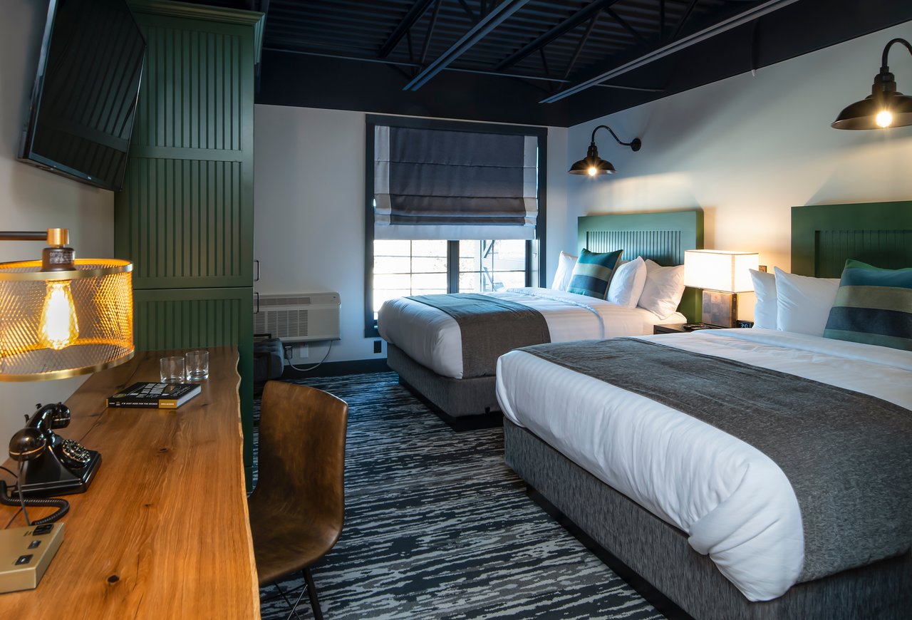 Top U.S. family travel blog Travel With A Plan details their stay at the newest Rainy Lake lodging option that is steps away from Rainy Lake and minutes away from Voyageurs National Park! Find out all you need to know about Cantilever Distillery +Hotel. #voyageursnationalpark #voyageursnationalparklodging #rainylakelodging #rainylakehotels #cantileverdistillery #cantileverhotel #ranierMN #placestostayonRainyLake