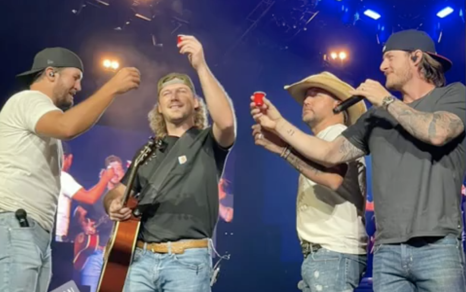 PostRehab, Wallen Does Shots, Sings Hits in Joining Luke Bryan