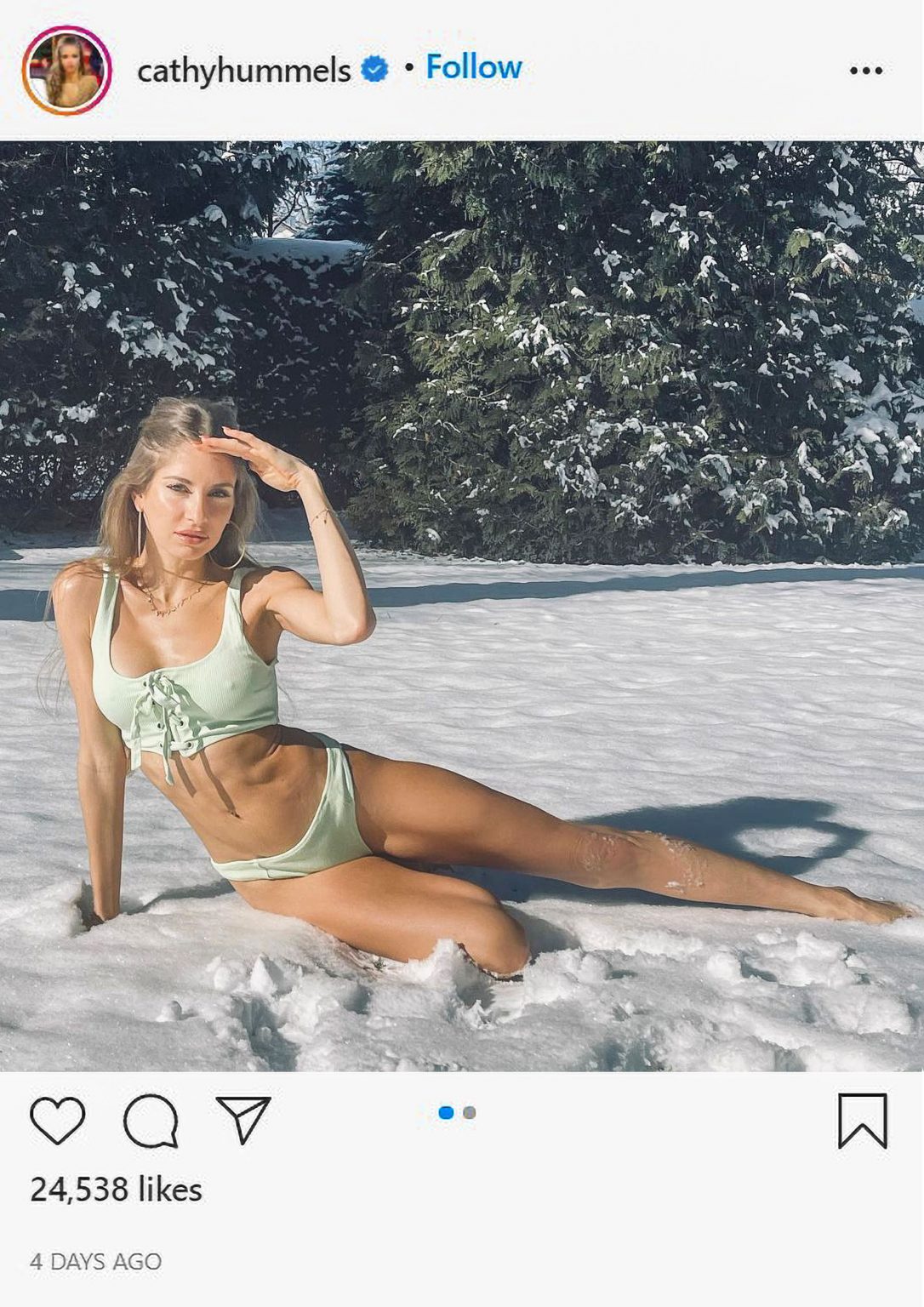 German WAG Roles In Snow In Bikini To Boost Immune System
