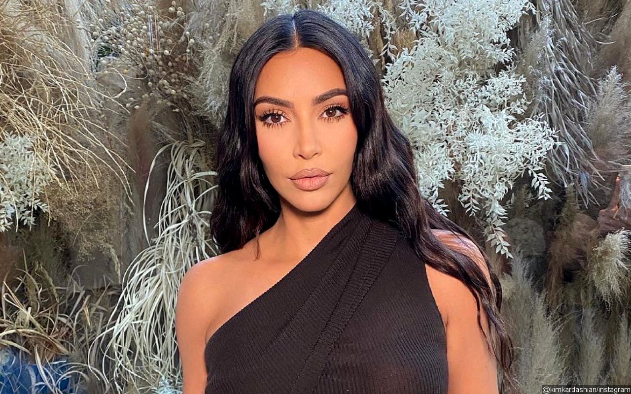 Kim Kardashian Bares Her Butt in Skimpy Black Thong Bikini