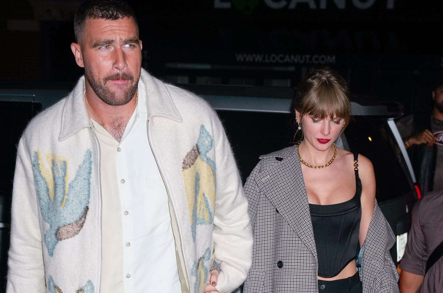 Taylor Swift & Travis Kelce Photographed Holding Hands At ‘SNL