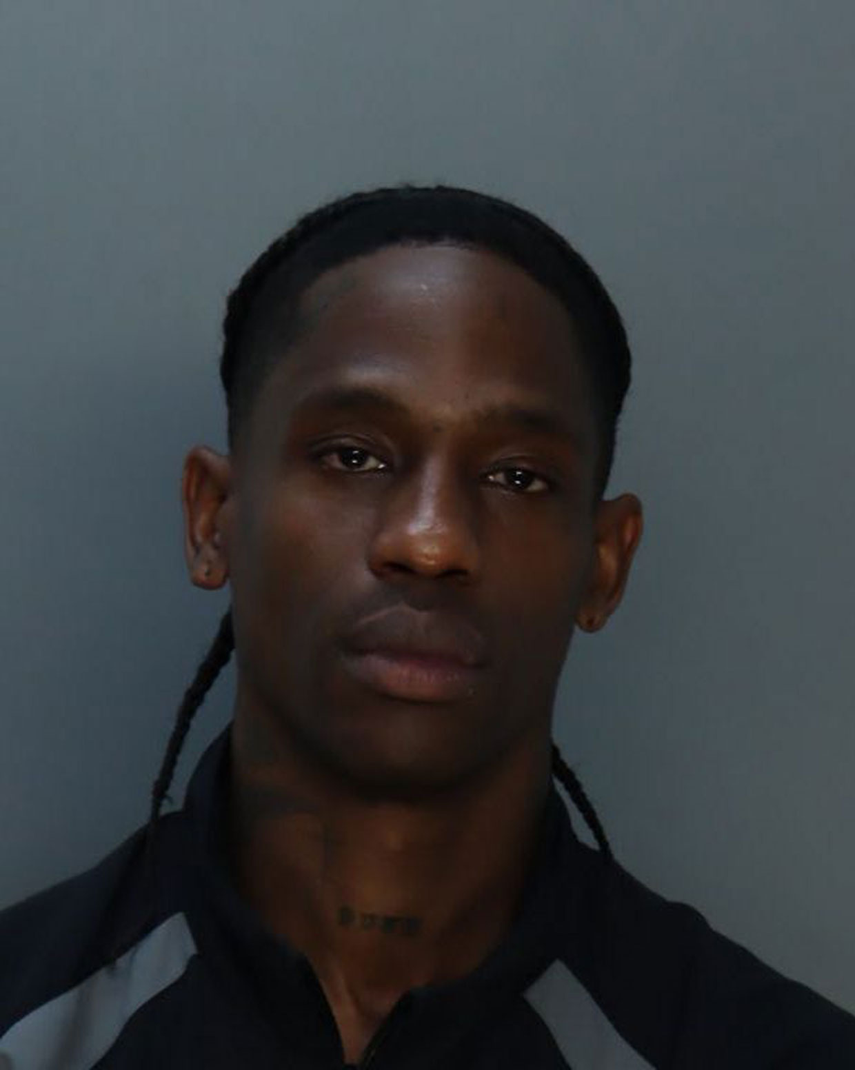 Travis Scott Releases TShirt Using Mug shot From Miami Arrest