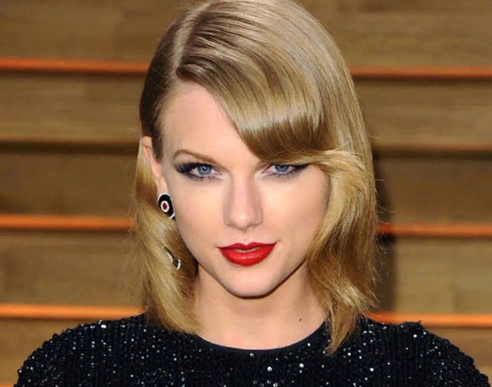 22 of Taylor Swift’s Best Curly, Straight + Short Hairstyles Brit + Co