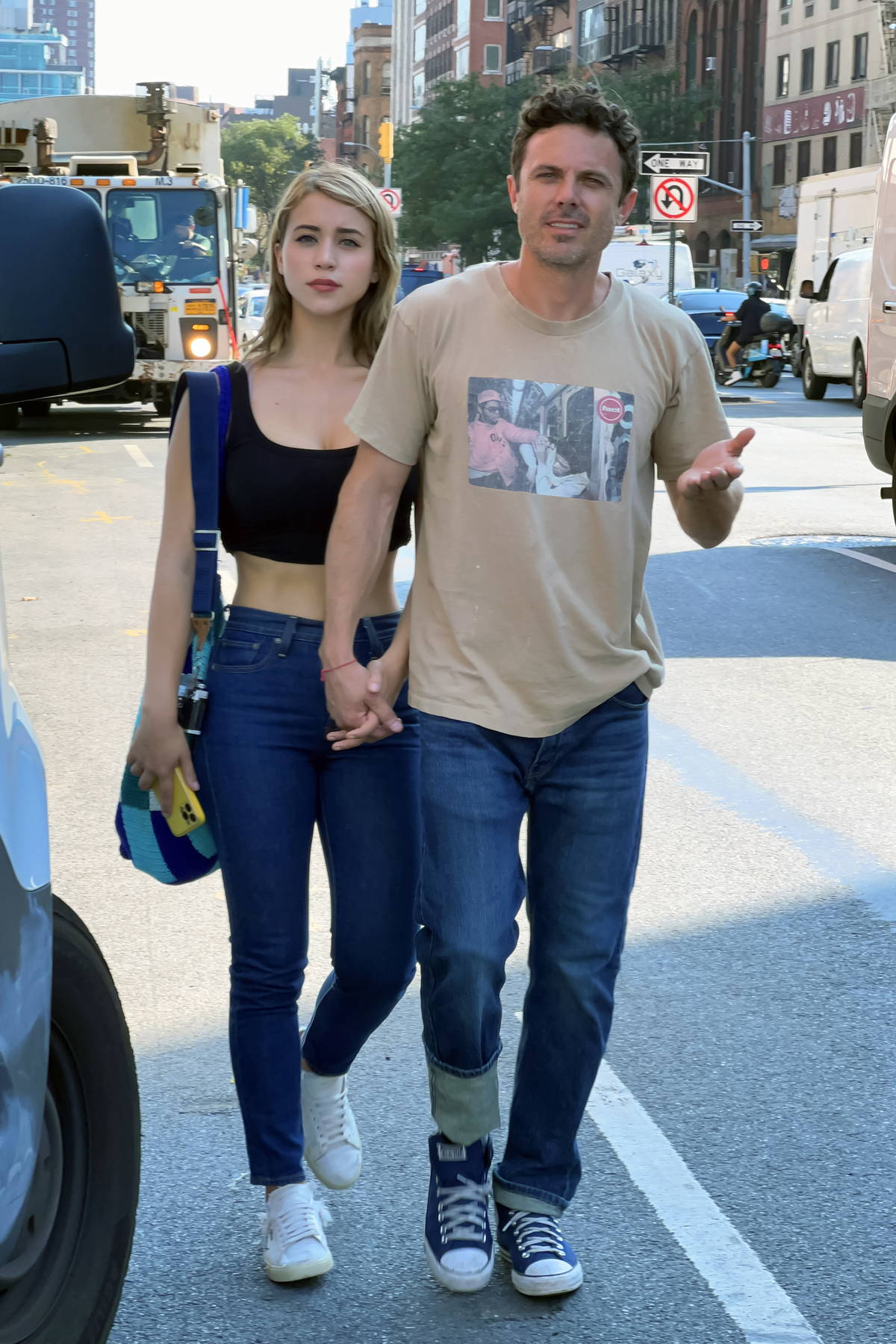 Caylee Cowan and Casey Affleck hold hands as they step out for lunch in