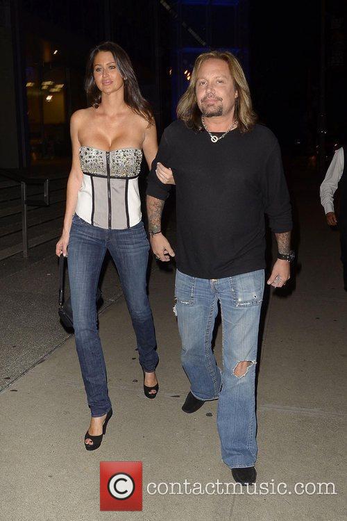Vince Neil arriving at BOA Steakhouse with a new girlfriend for
