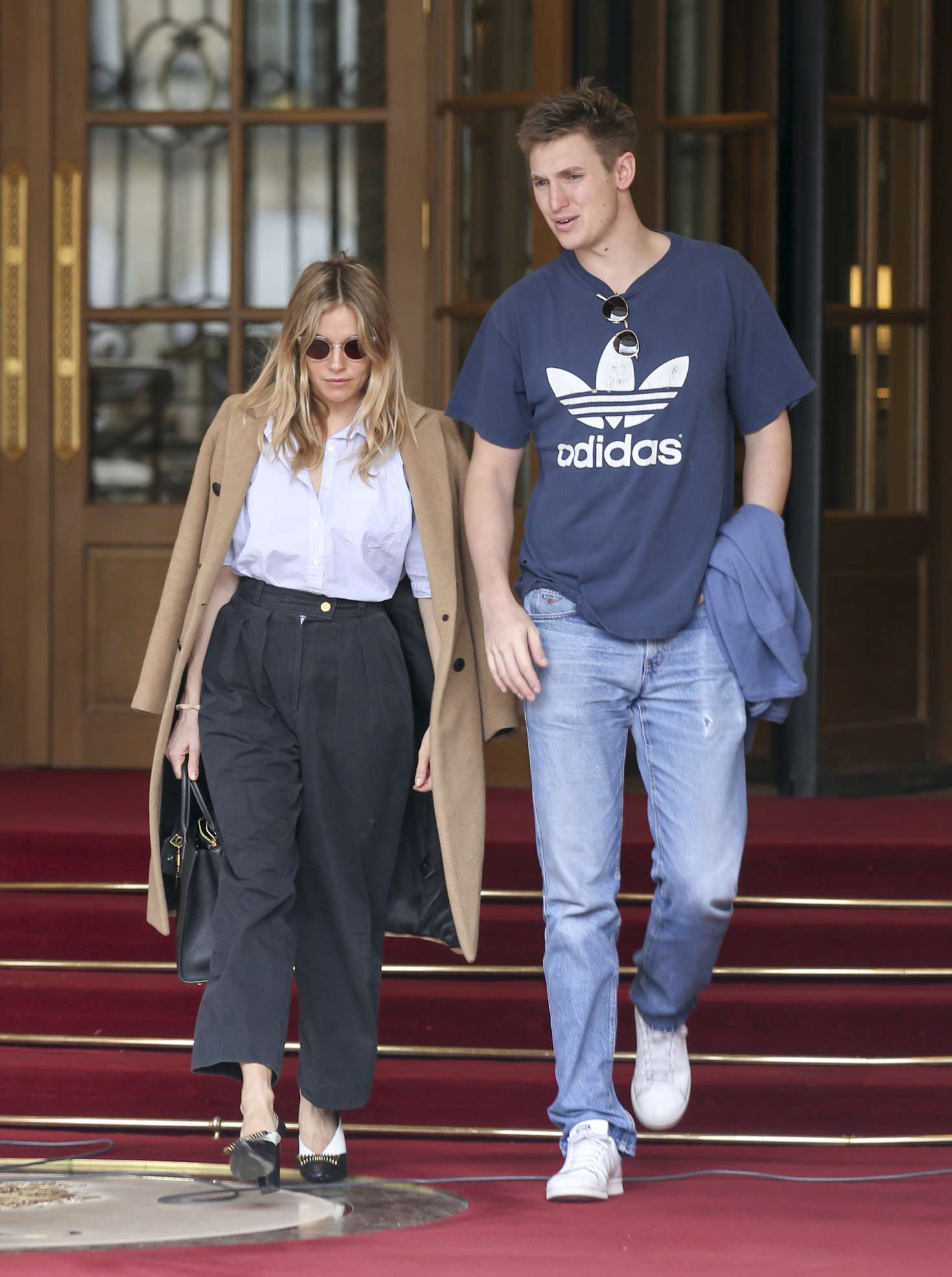 Sienna Miller and boyfriend Lucas Zwirner Leave their hotel in Paris