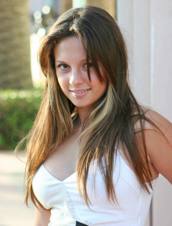 Christine Lakin's side feature hair with flippy coils and Mackenzie Rosman's long brown hair