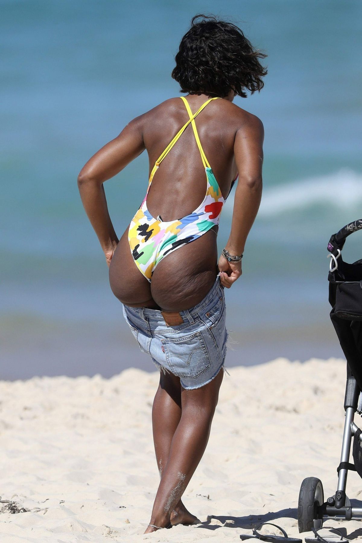 KELLY ROWLAND in Swimsuit on the Beach in Sydney 03/27/2017