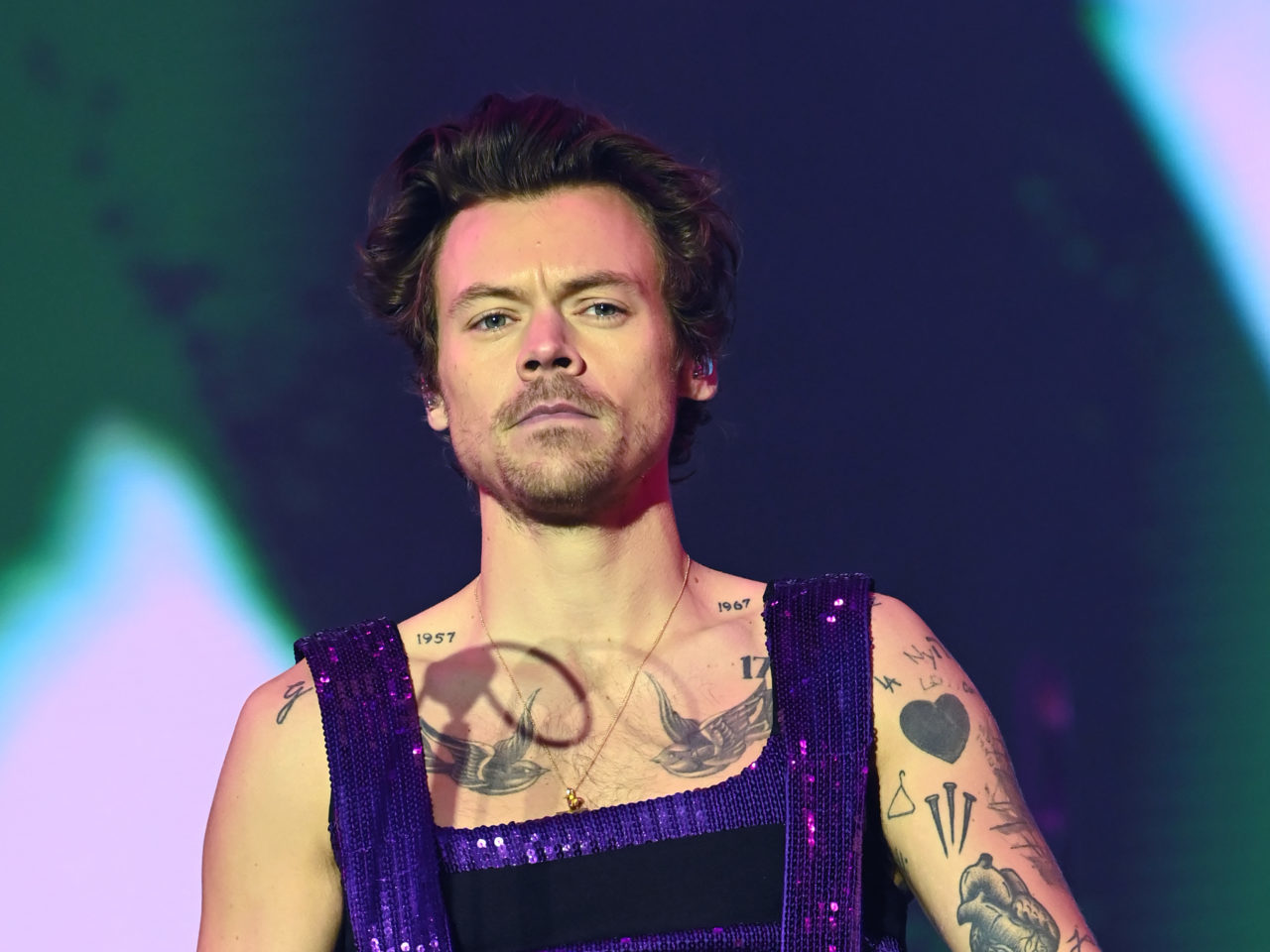 How many tattoos does Harry Styles have?