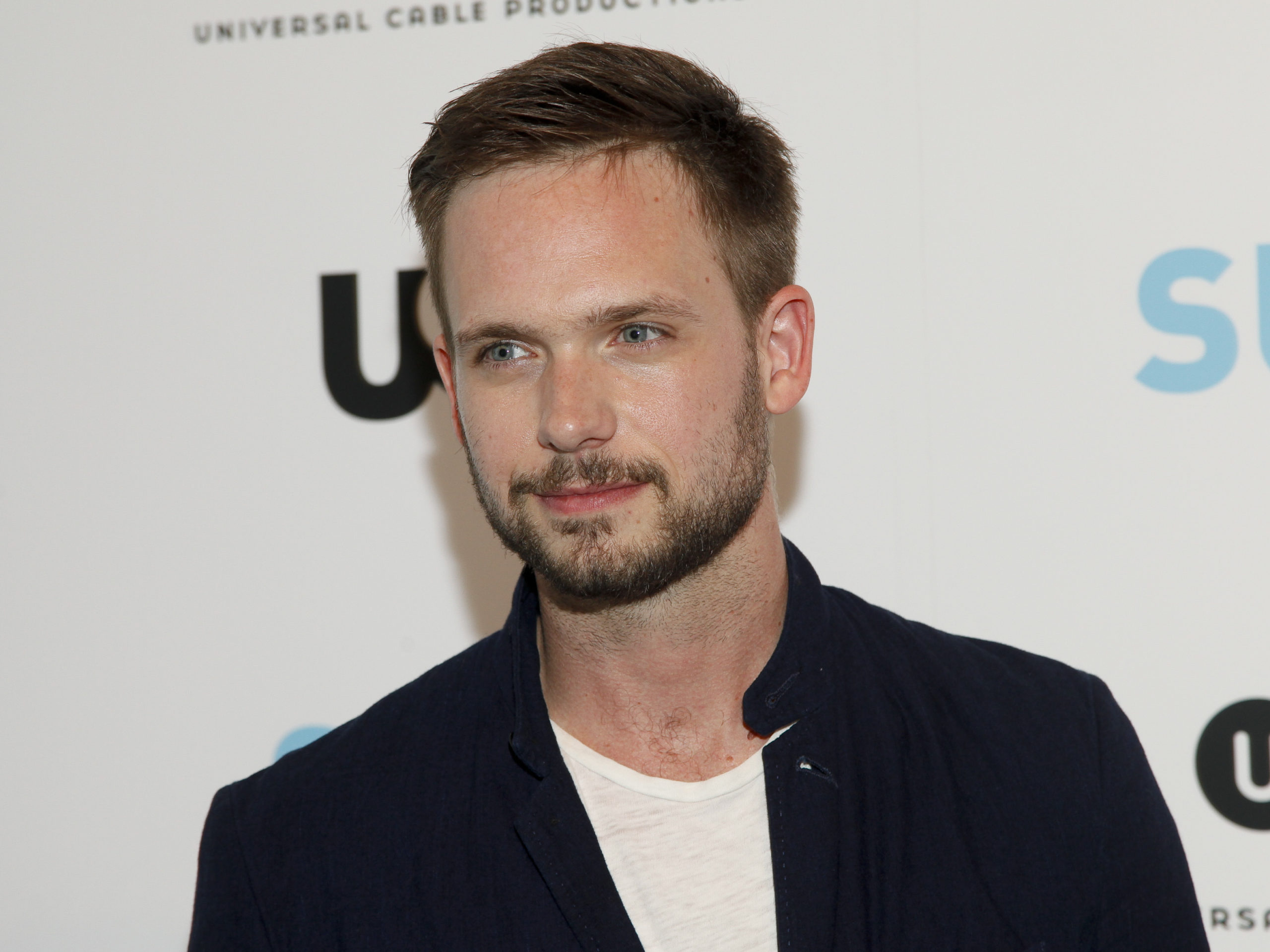 Patrick J. Adams defends ‘Suits’ costar Meghan Markle amid royal