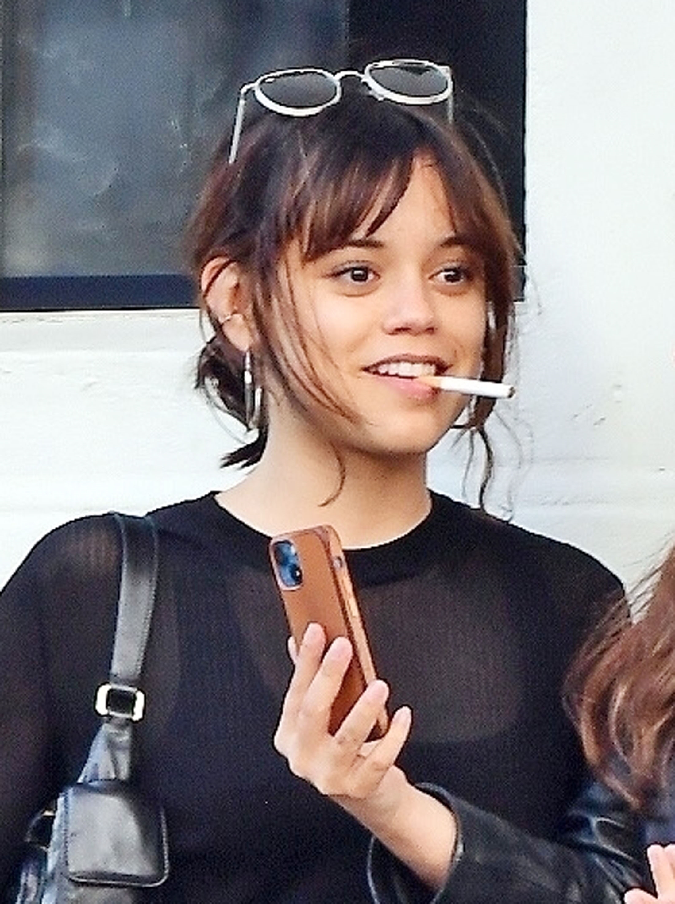 Jenna Ortega, 20, ripped after she's caught smoking cigarettes in new photos as fans say her