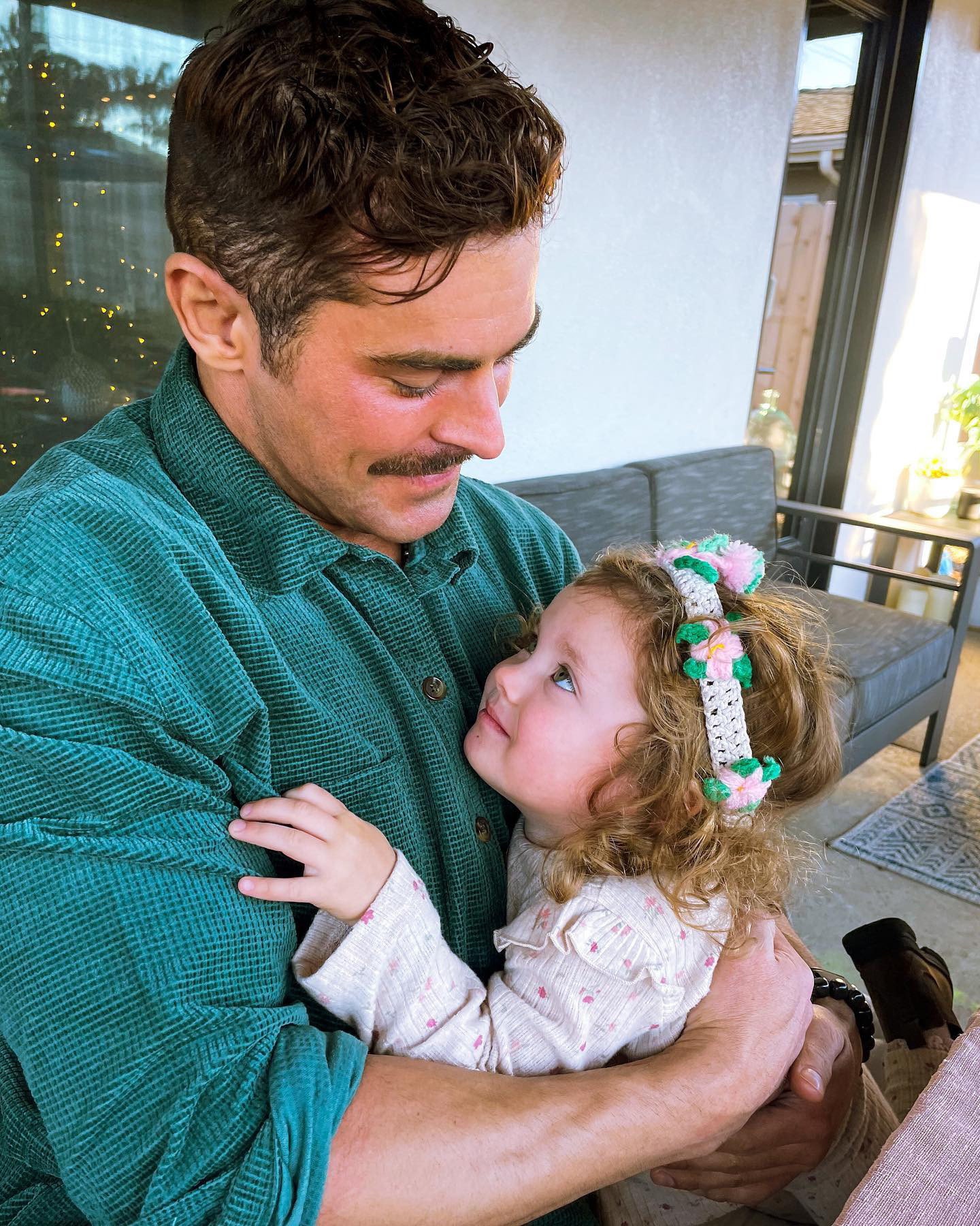 Zac Efron Cuddles Up With Baby Sister Olivia on Her Birthday Photo