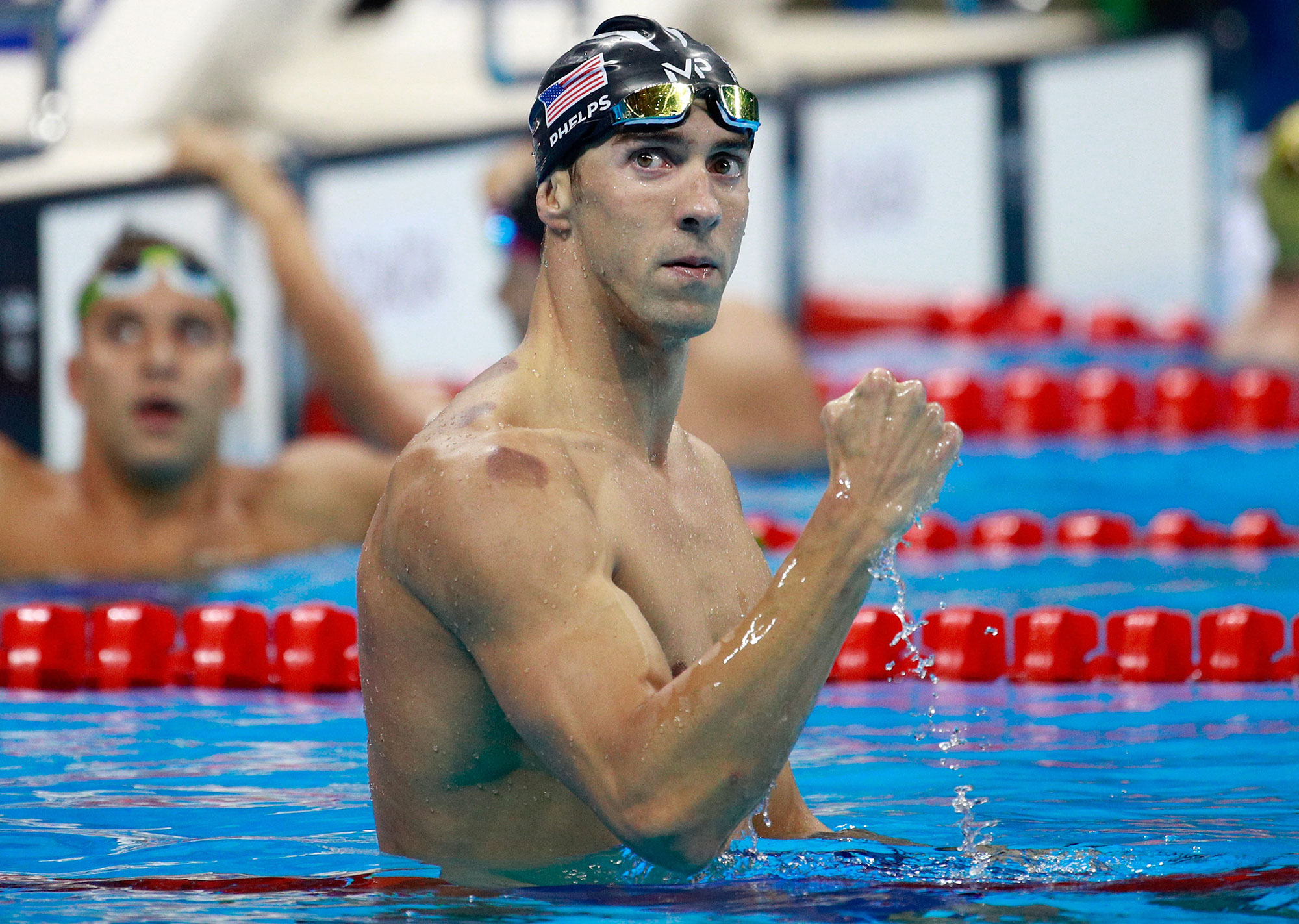 Michael Phelps Wins 20th Gold Medal, Son Boomer Steals the Show