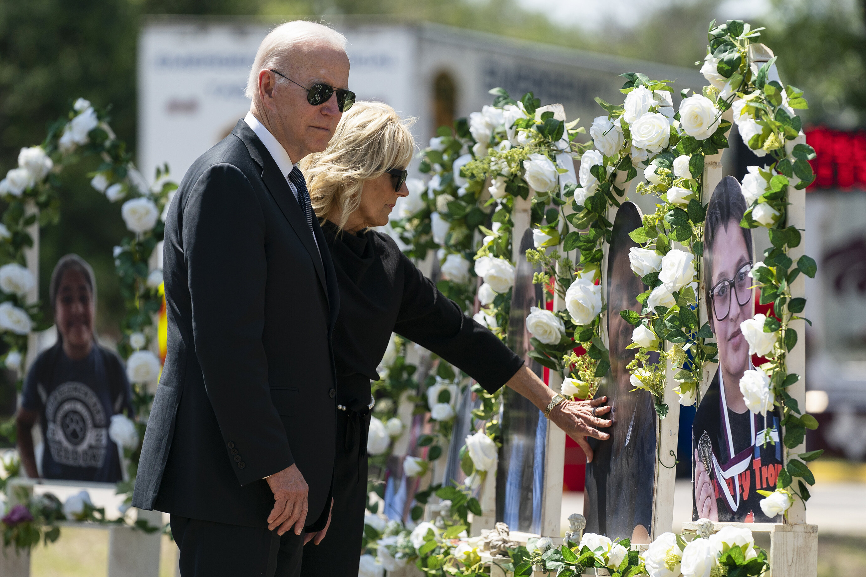 President Joe Biden and first lady Jill Biden visit a memorial at Robb Elementary School to pay their respects to the victims of the mass shooting May 29, 2022, in Uvalde, Texas. 