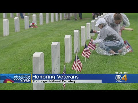 Volunteers Plant Over 100,000 Flags At Fort Logan...