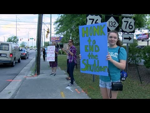 Dozens protest at busy Wilmington intersection to...