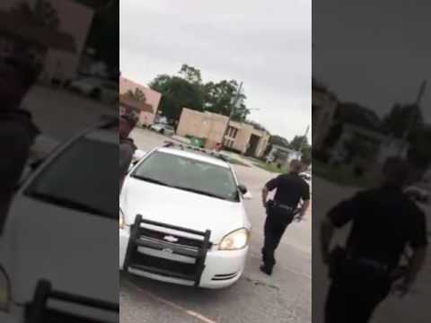 Florida White Cop Threatens To Lock Up Black Man For...