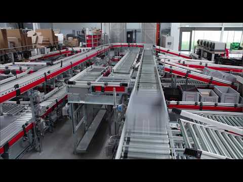 Production and logistics center with milk run system...