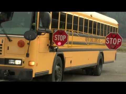 Extended school bus stop signs make roads safer in...
