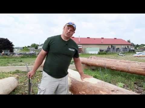 How To Build A Log Home | Log Peeling With A Drawknife