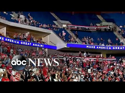Trump speaks at convention center with empty seats at...