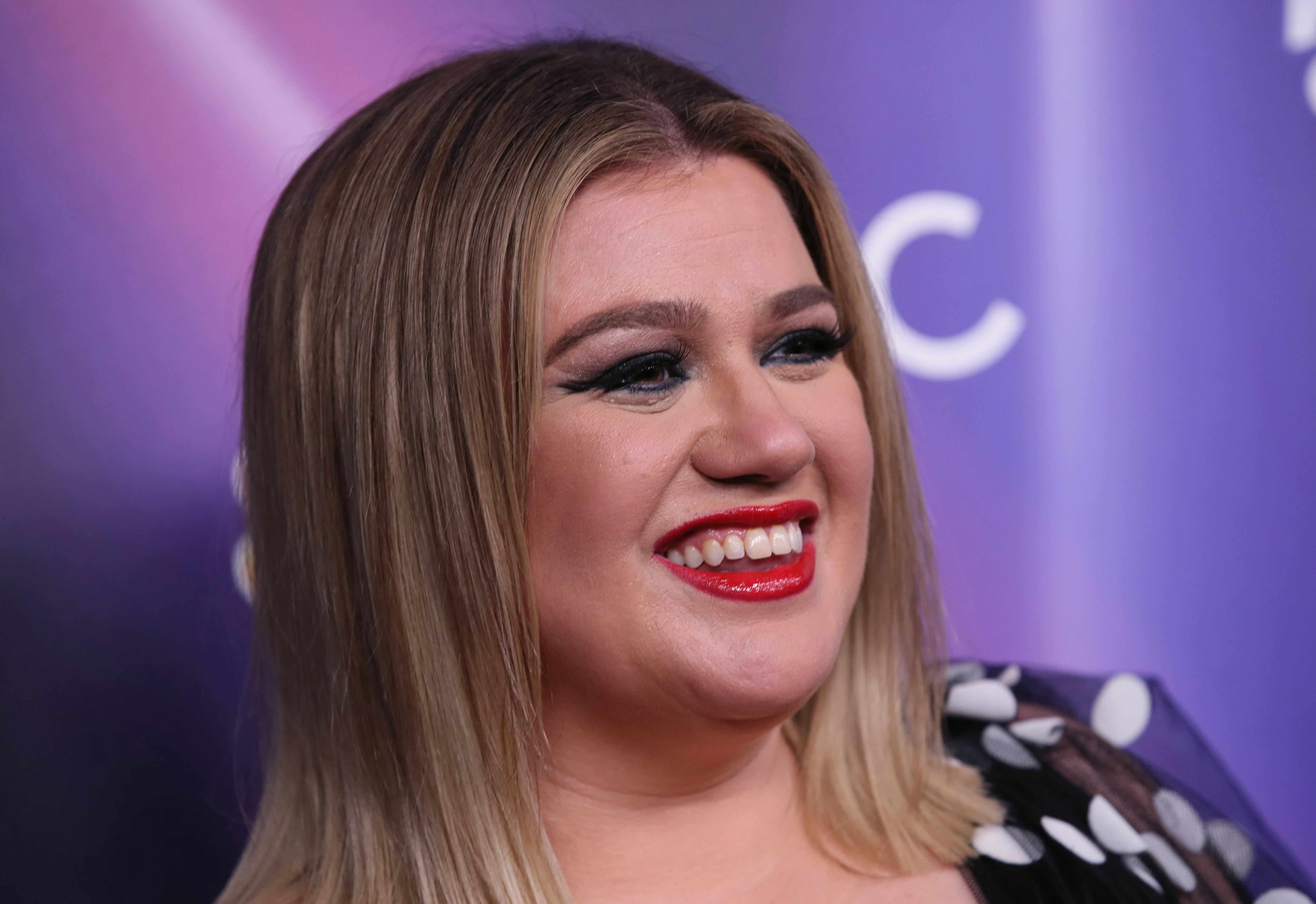 Kelly Clarkson shares what helped her cope with her divorce to Brandon Blackstock.