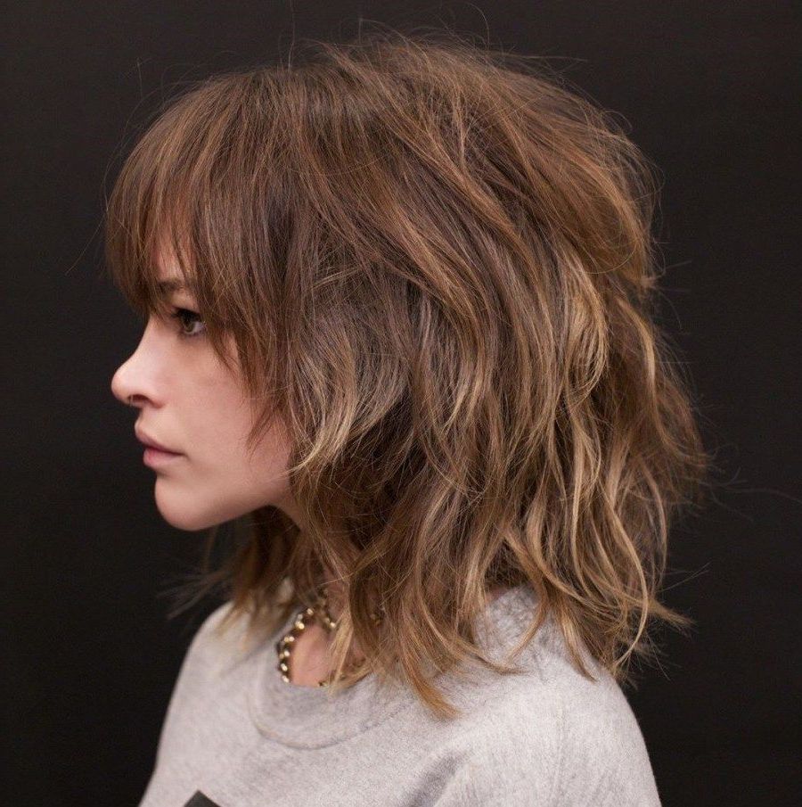 Featured Photo of Medium Messy Shag Haircuts With Arched Bangs