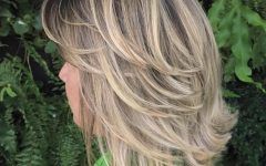 Flipped Lob Hairstyles with Swoopy Back-swept Layers